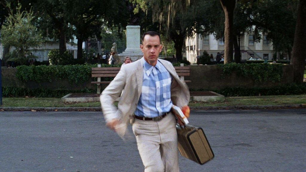 Forrest Gump Wallpaper: Iconic Scene with Character & Park Background