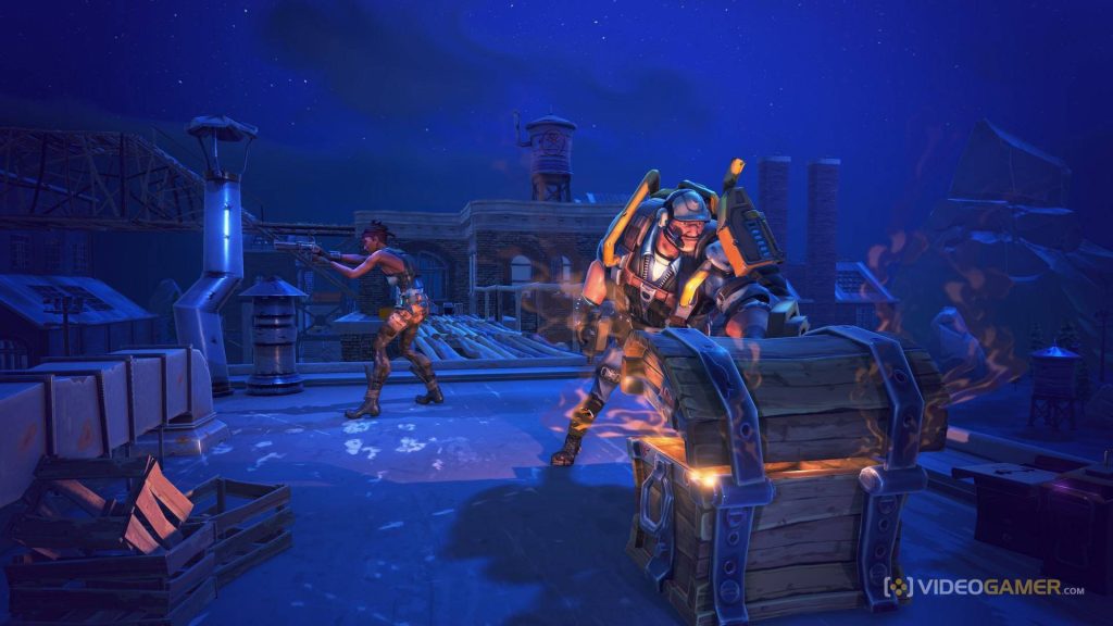 Fortnite Battle Royale characters looting glowing chest on dark urban rooftop at night wallpaper