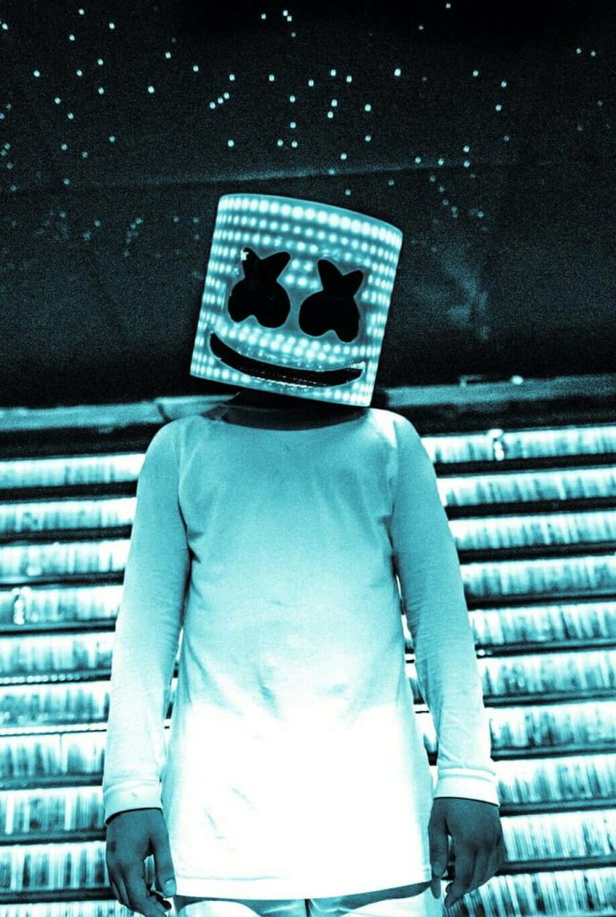 Fortnite Marshmello wallpaper with DJ helmet cyan concert background high contrast electric vibe
