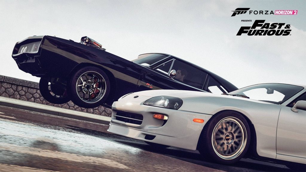 Black Dodge Charger and silver Toyota Supra racing fast in Forza Horizon 2 Fast Furious wallpaper