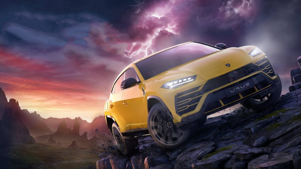 Yellow Lamborghini Urus driving rocky terrain at twilight in Forza Horizon 4 Fortune Island wallpaper