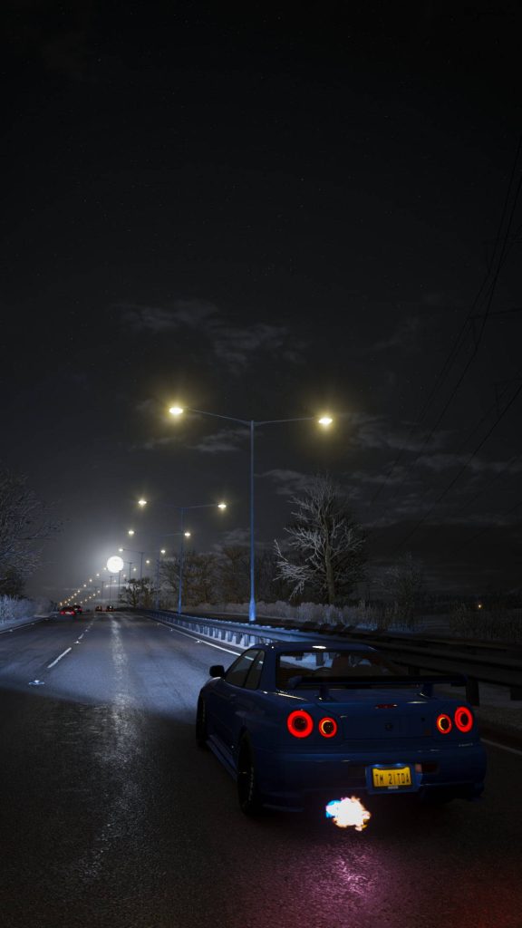 Blue Nissan Skyline GT-R R34 at night with glowing taillights and exhaust flame snowy road Wallpaper