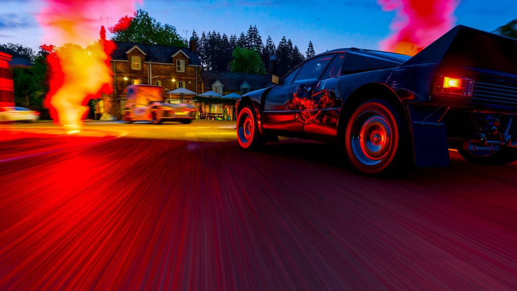 Forza Horizon 4 sports car racing through rustic village at dusk with red smoke and motion blur Wallpaper
