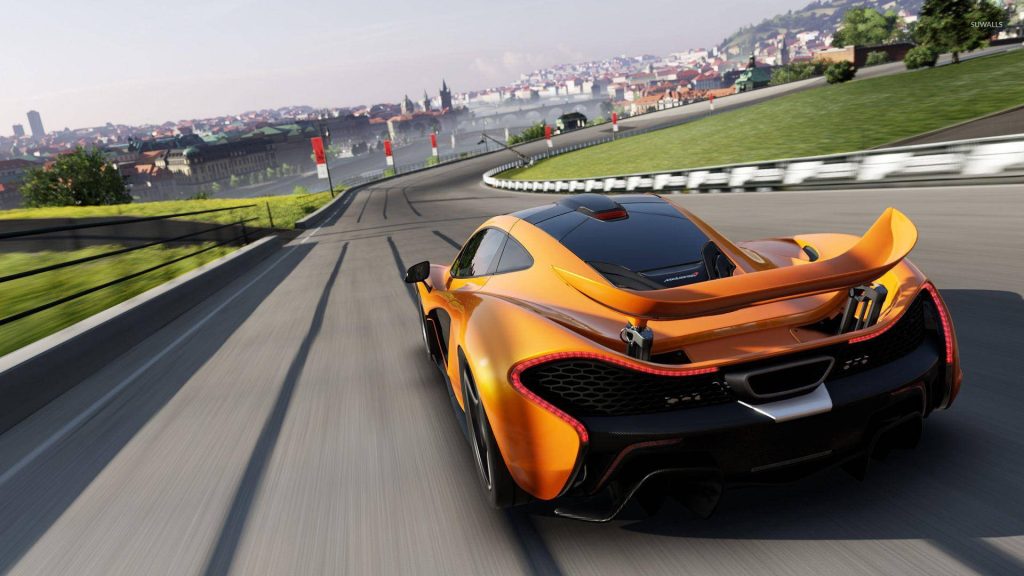 Orange McLaren P1 racing on Prague circuit at sunset Forza Motorsport 7 high-speed action wallpaper