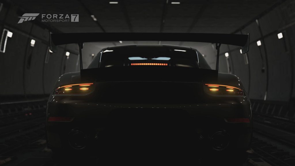 Rear view Porsche 911 GT3 race car glowing tail lights dark tunnel Forza Motorsport 7 wallpaper