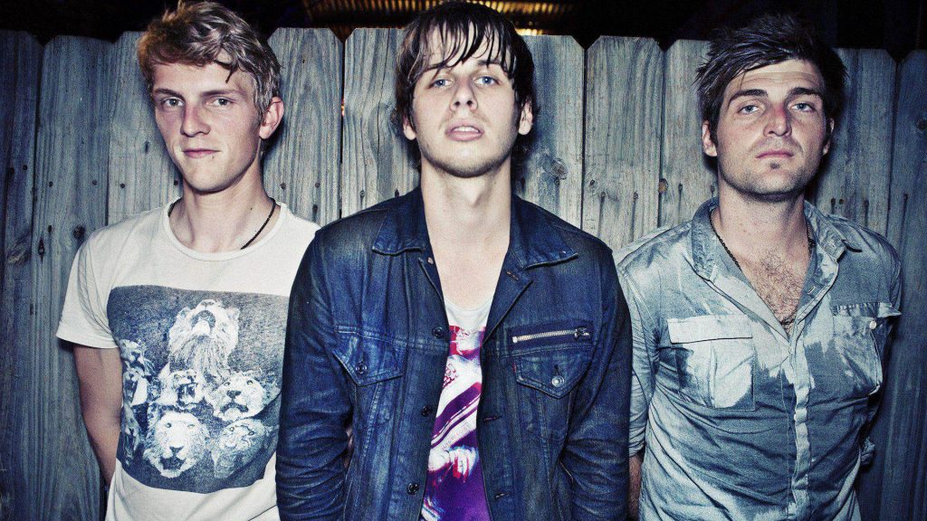 Foster the People band portrait urban rustic wooden fence indie cool-toned Pumped Up Kicks wallpaper
