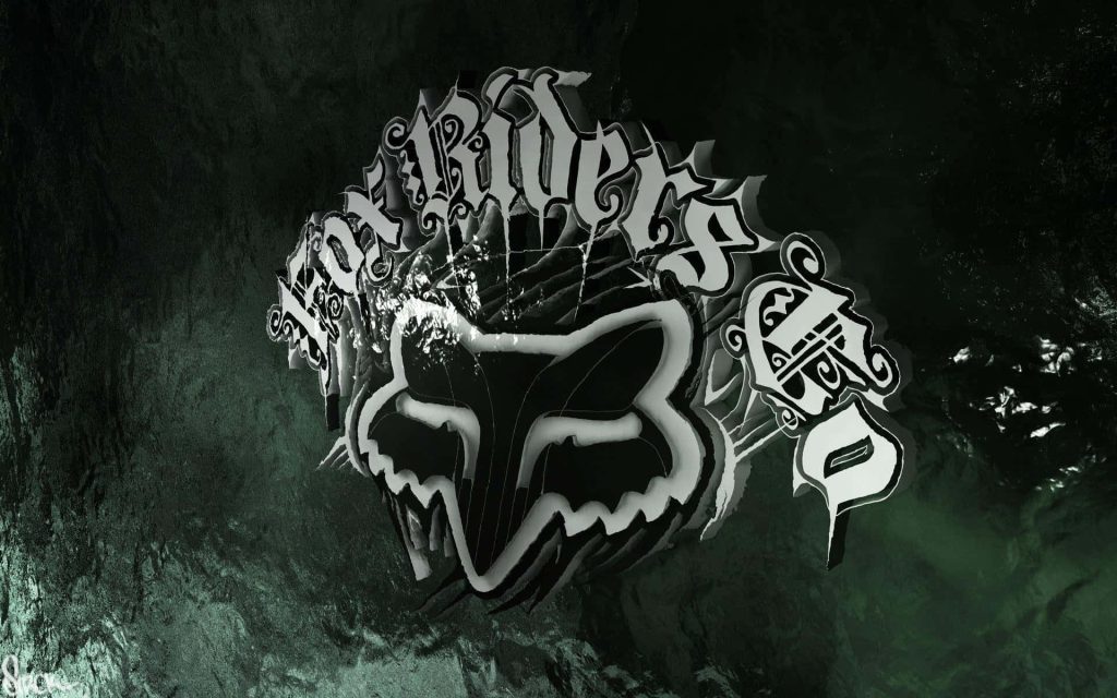 Fox Racing wallpaper with 3D Fox head logo and Fox Riders Co text on dark green textured background