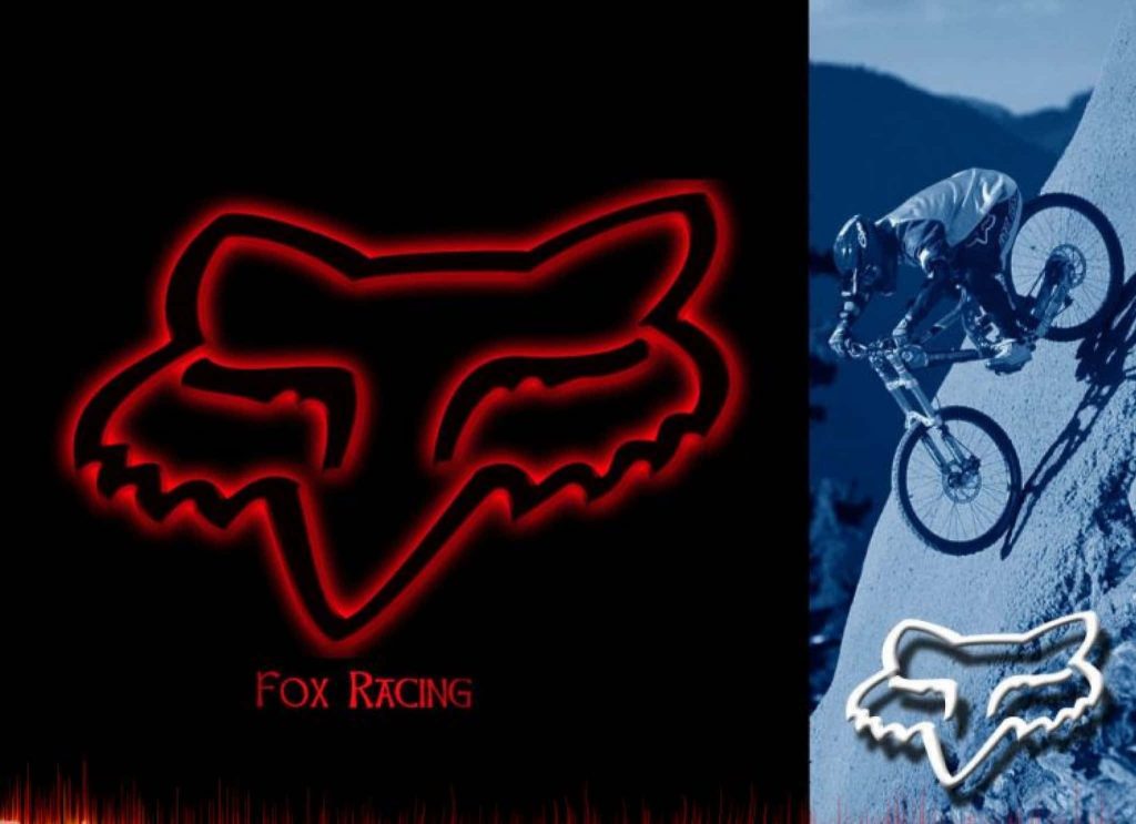 Fox Racing wallpaper with glowing red logo and mountain biker on steep trail background