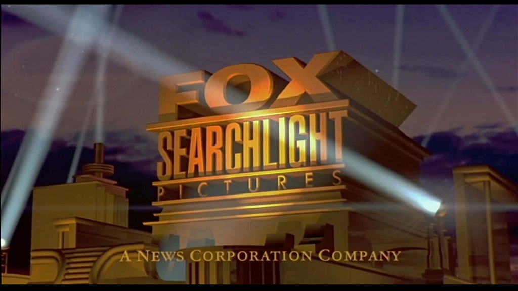 Fox Searchlight Pictures 3D golden logo with dramatic searchlights and twilight sky wallpaper background