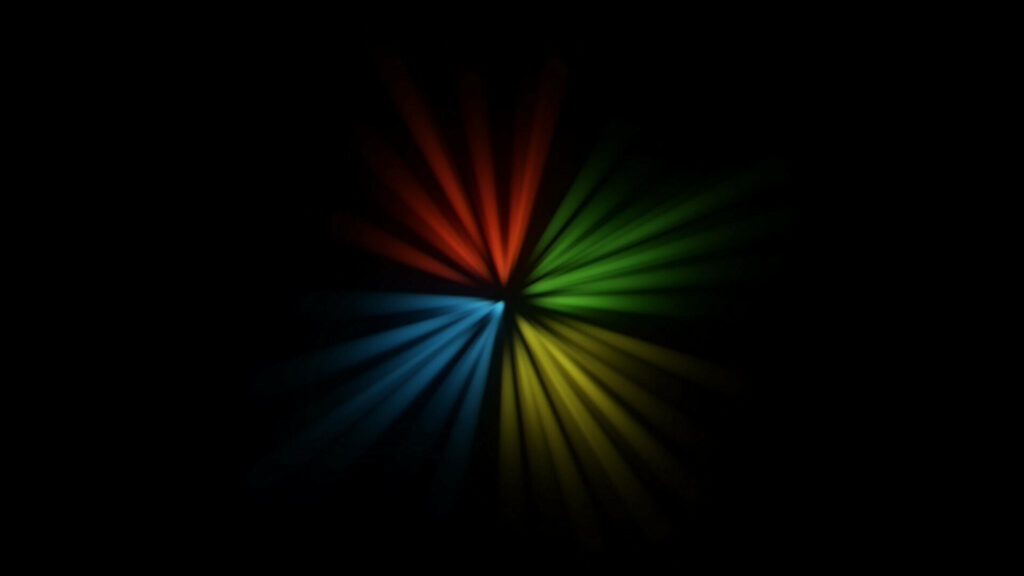 Vibrant Fractal Lights Illuminate the Windows Logo against a Mysterious Black Background Wallpaper