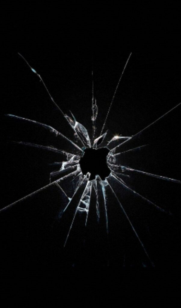 Shattered Technology: Broken Computer Screen Wallpaper