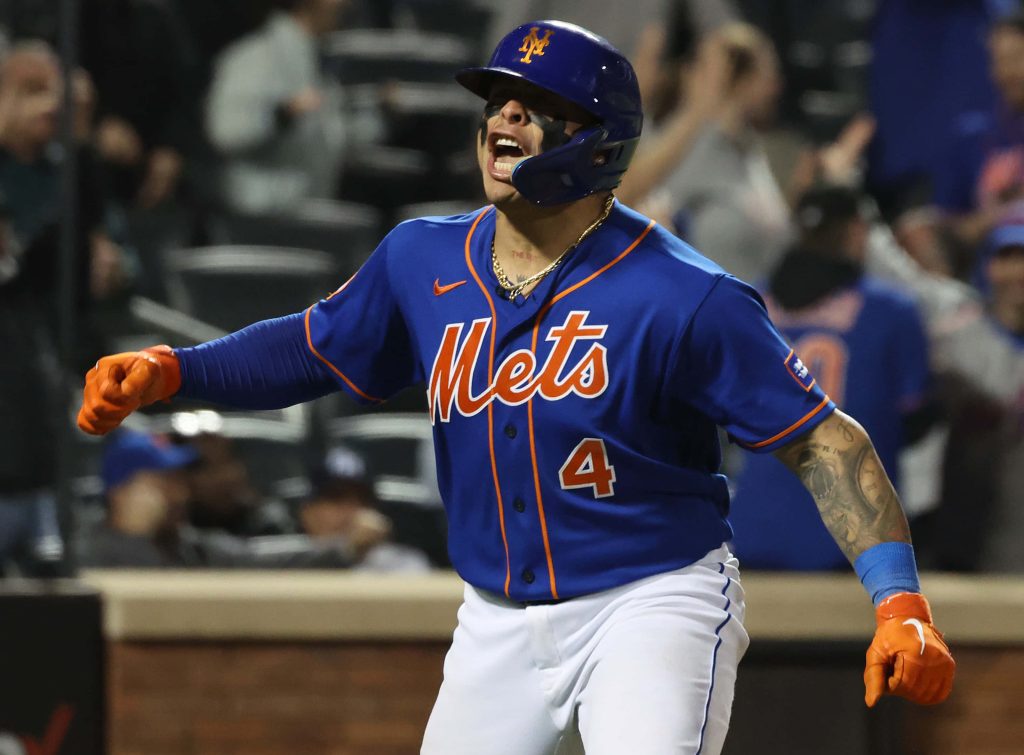 Francisco Alvarez Mets catcher celebrating in blue jersey orange gloves dynamic baseball wallpaper
