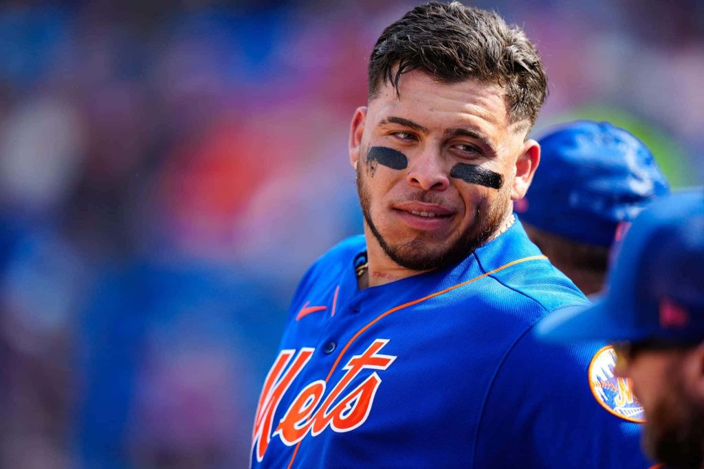 New York Mets catcher Francisco Álvarez in blue uniform close-up on field MLB sports wallpaper