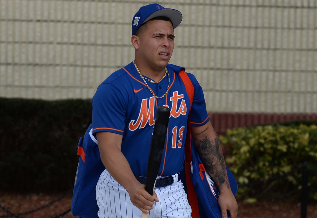 Francisco Alvarez Mets wallpaper catcher with bat gear arm tattoo gold chain focused gaze