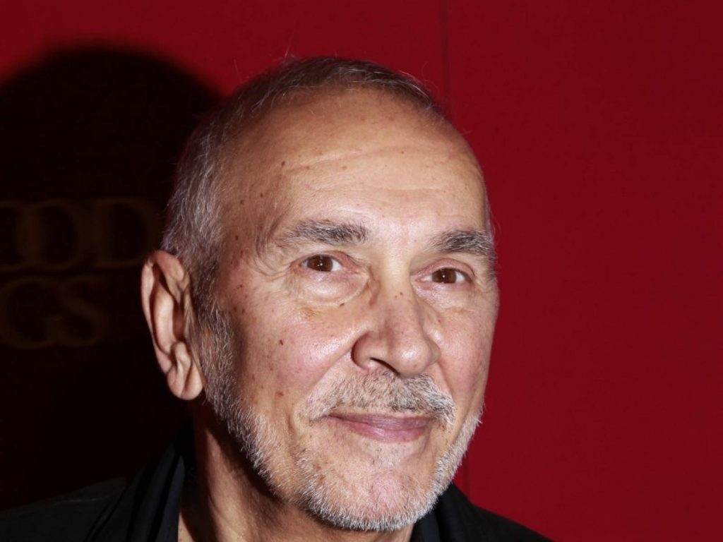 Frank Langella close-up portrait wallpaper with deep red background sharp expressive features