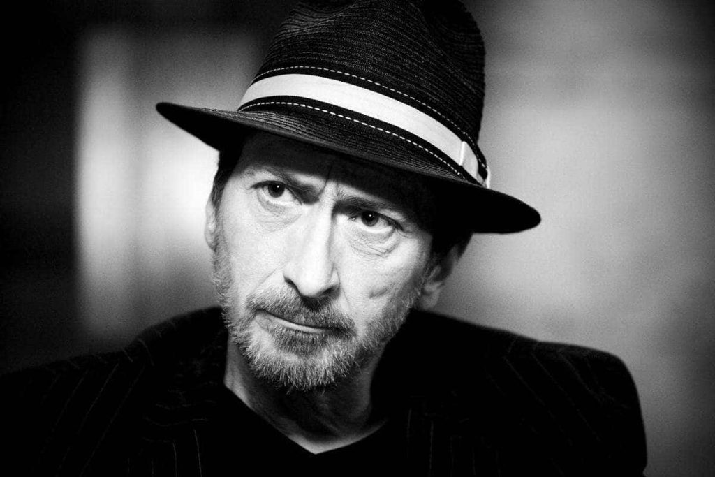 Frank Miller high contrast black and white portrait in fedora noir comic creator wallpaper
