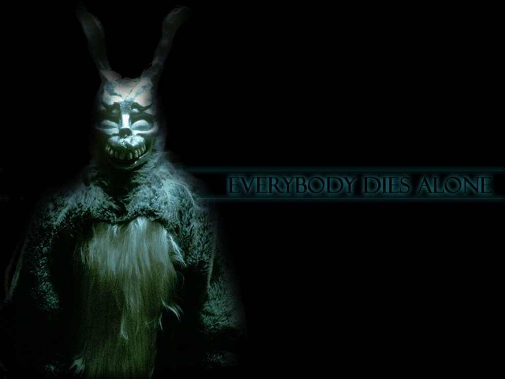 Frank the Rabbit from Donnie Darko in eerie green light with Everybody Dies Alone phrase wallpaper