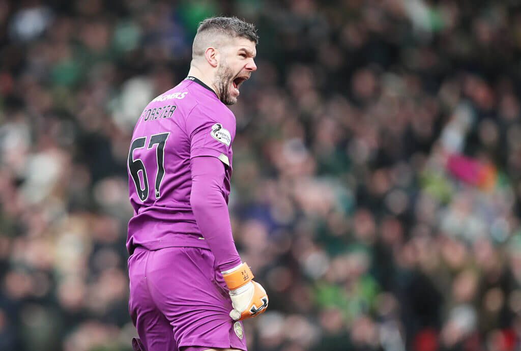 Goalkeeper Fraser Forster in purple Celtic jersey shouting with blurred stadium crowd background Wallpaper