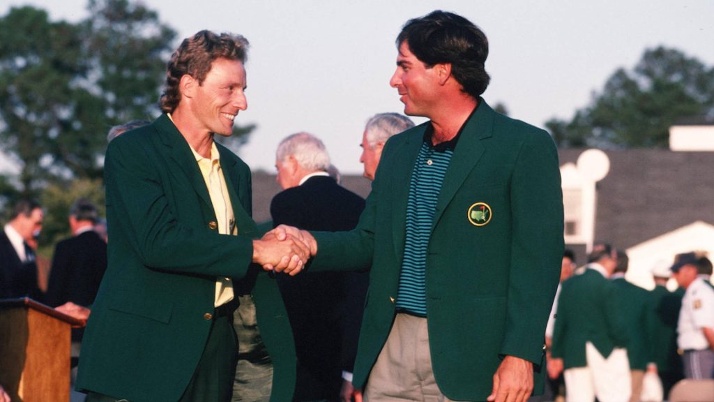 Fred Couples and Bernhard Langer Masters green jacket handshake iconic golf history wallpaper