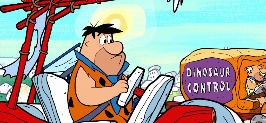 Fred Flintstone driving foot-powered Flintmobile with Dinosaur Control vehicle animated wallpaper