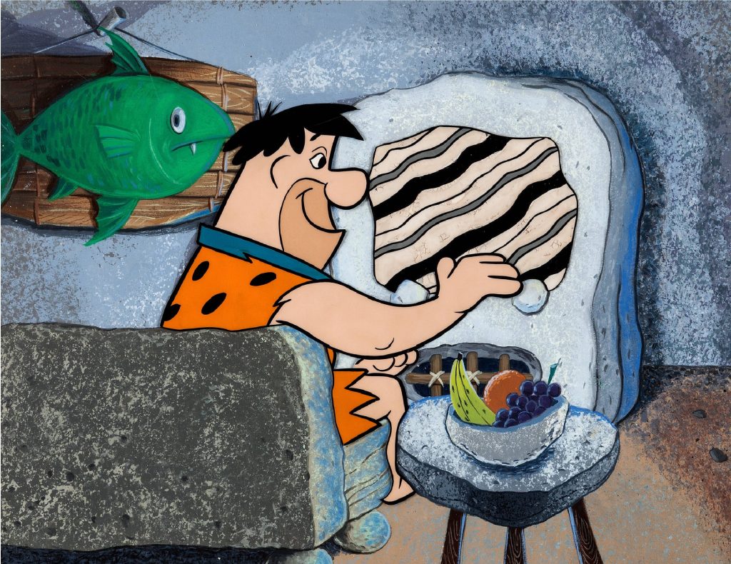 Fred Flintstone in orange tunic relaxing in prehistoric stone home with quirky green fish plaque Wallpaper