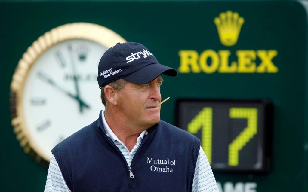 Fred Funk golfing wallpaper with Stryker cap Mutual of Omaha vest Rolex clock tournament background