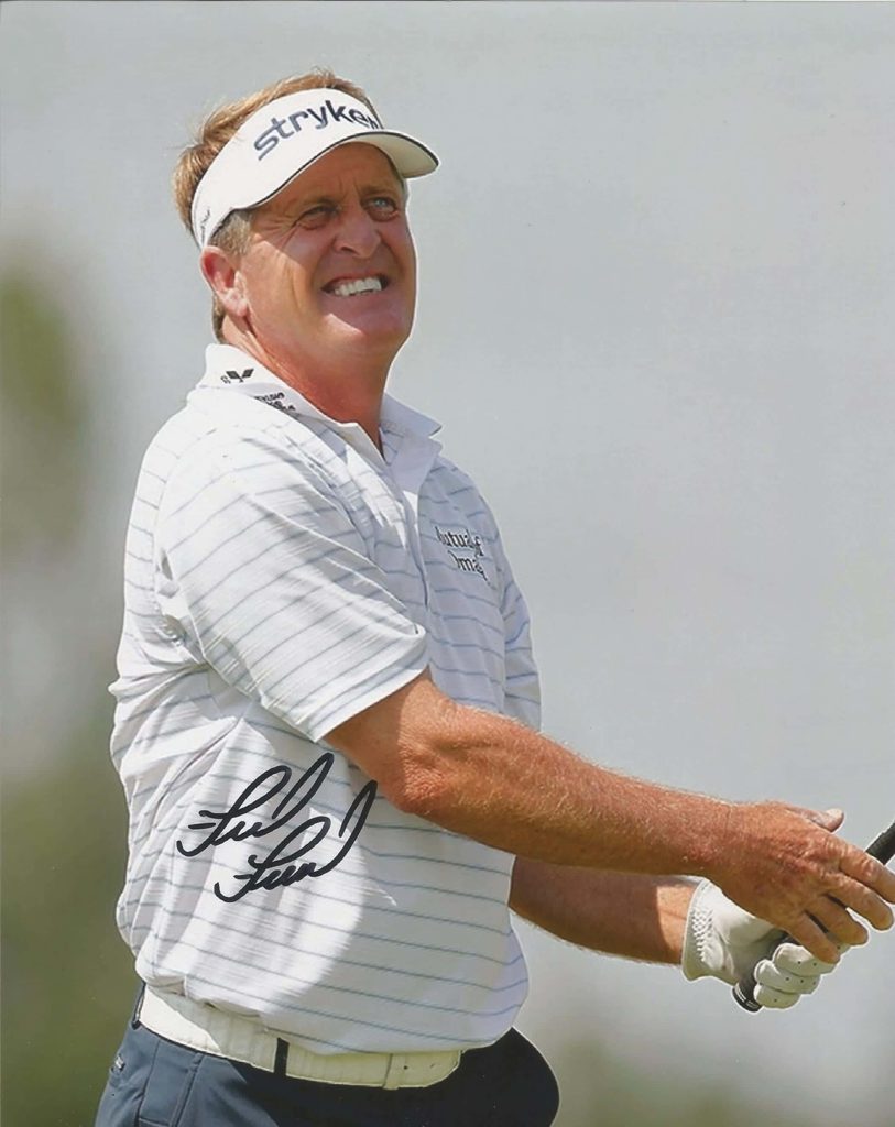 Fred Funk smiling on golf course wearing Stryker visor and striped polo high quality wallpaper