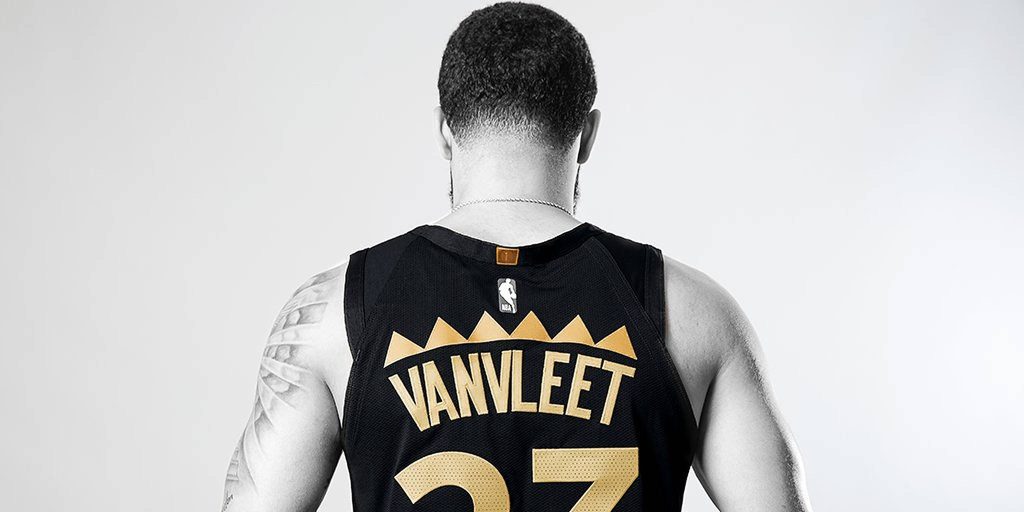 Fred VanVleet back view in black gold jersey NBA star studio photo minimalist wallpaper background