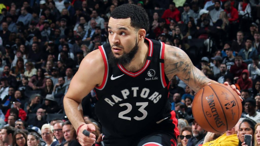 Fred VanVleet dribbling basketball in number 23 Raptors jersey intense game moment wallpaper