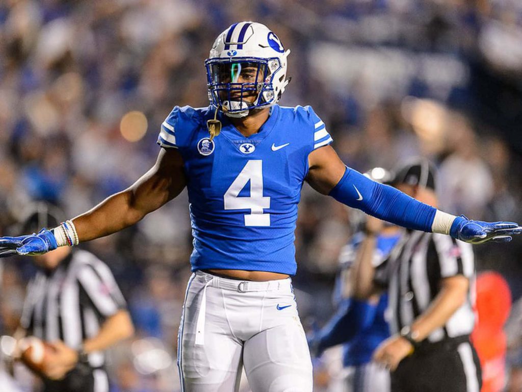 Fred Warner BYU linebacker celebrating in blue uniform number 4 vibrant stadium football wallpaper