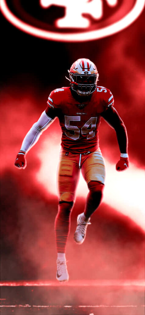 Fred Warner 49ers Wallpaper: Intense Linebacker in Dynamic Pose