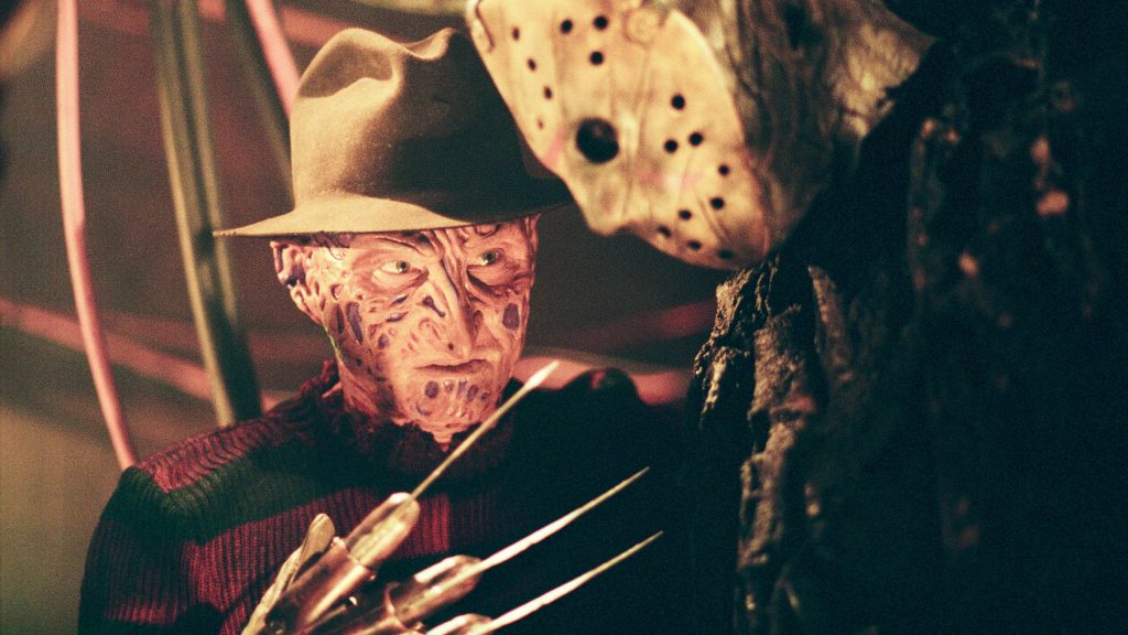 Freddy Krueger and Jason Voorhees intense horror showdown close-up cinematic wallpaper background