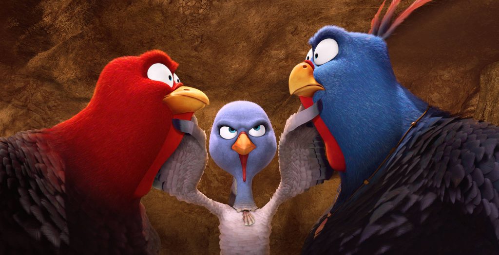 3D animated Free Birds wallpaper showing Reggie Jenny and Jake in a dramatic colorful close-up