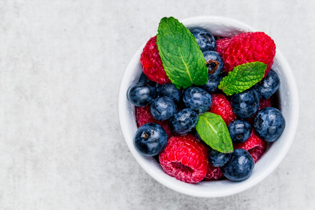 Fresh Wallpaper: White Bowl of Juicy Blueberries & Raspberries