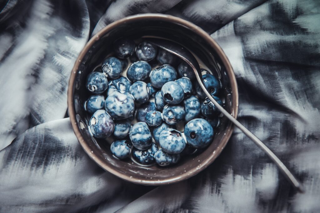 Fresh Blueberries in Milk: Textured Wallpaper Background Close-Up