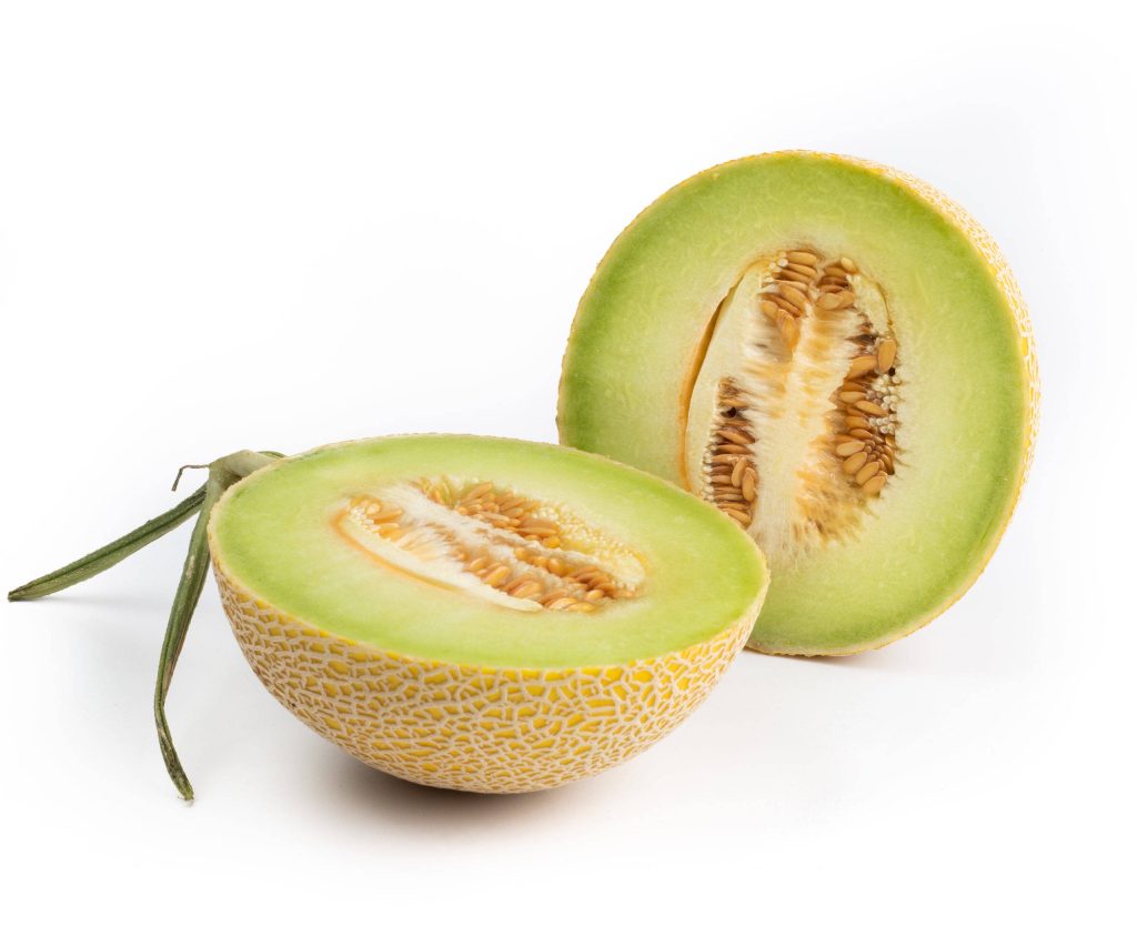 High-resolution wallpaper of fresh cantaloupe cut in half with vibrant juicy interior and white background