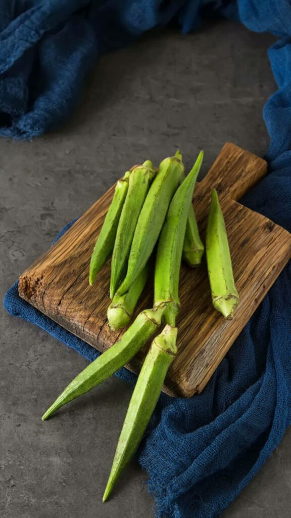 Fresh Green Okras on Rustic Board: Beautiful Wallpaper Background