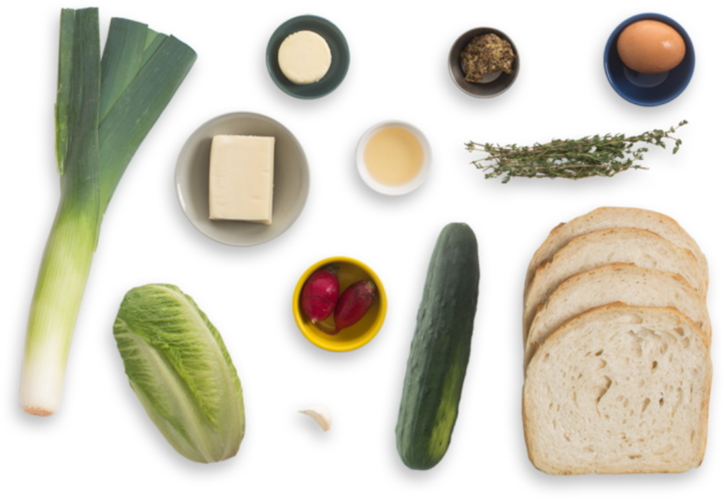 Top-View Fresh Ingredients Layout: Leek, Lettuce, Bread & More Wallpaper