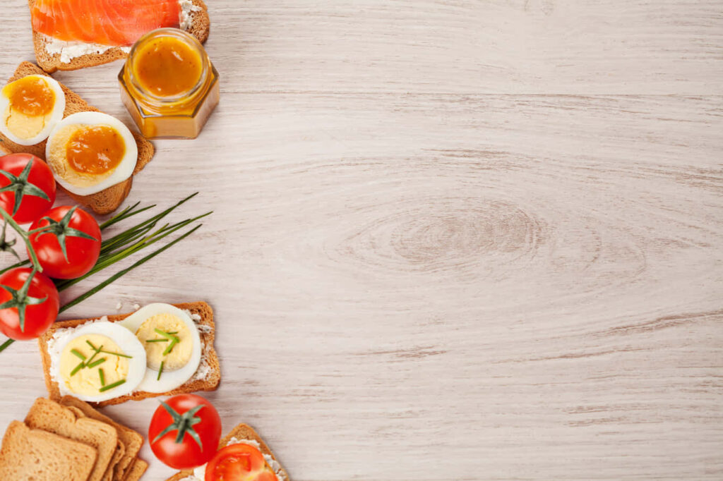 Fresh Ingredients: Cherry Tomatoes, Eggs, Salmon & Toasted Bread Wallpaper