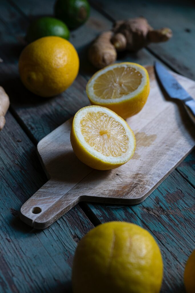 Vibrant Lemon Wallpaper on Rustic Wood - Citrus Charm Background