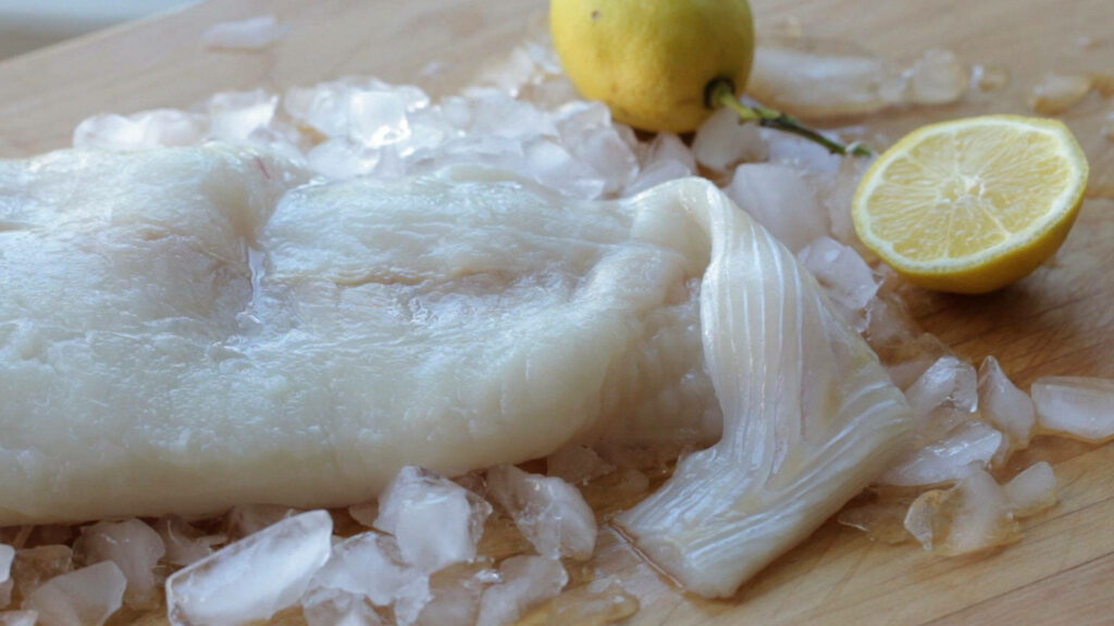 Fresh Norwegian Halibut Lutefisk on Ice with Lemon - Textured Wallpaper