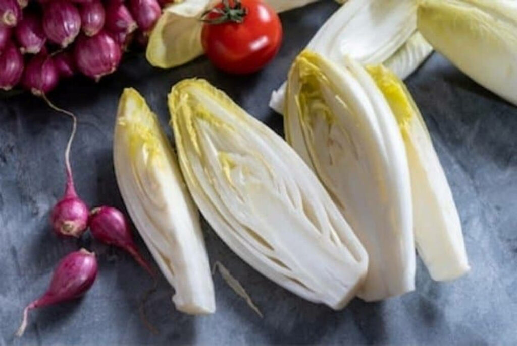 Fresh Endive Leaves with Cherry Tomatoes & Onions - Wallpaper Background