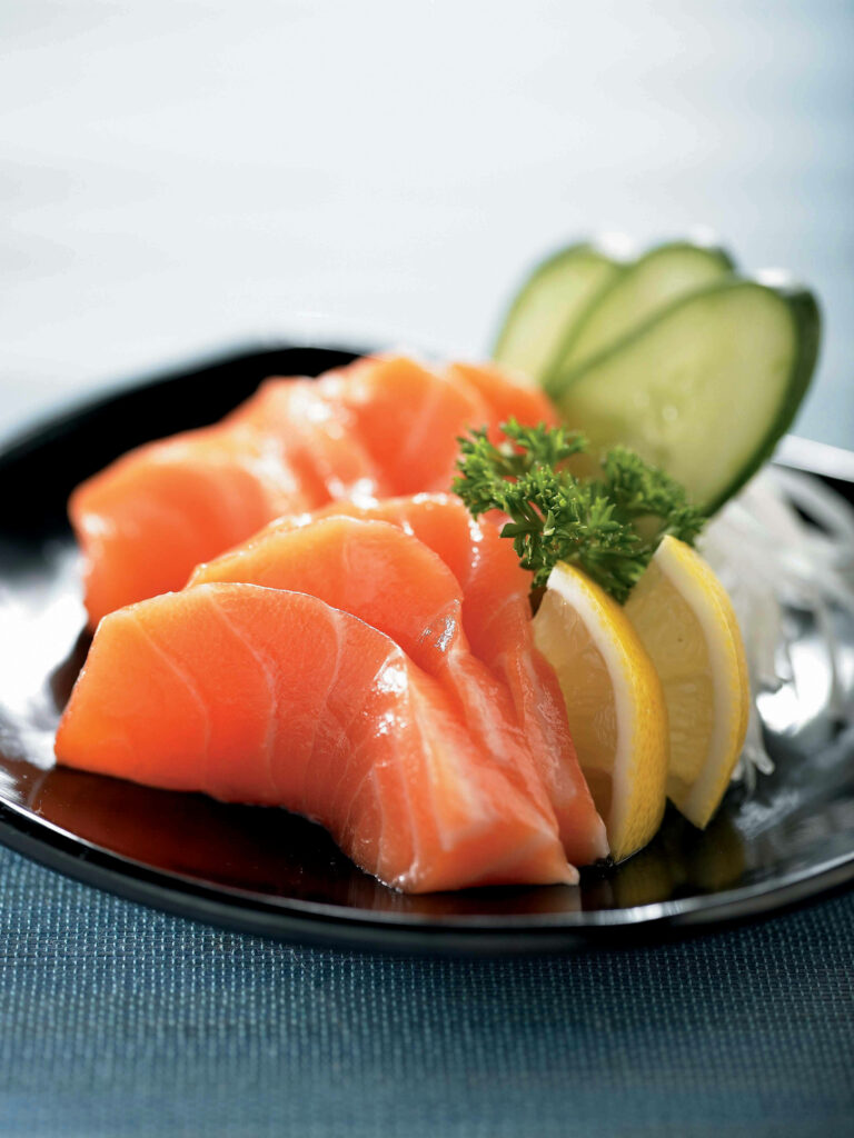 Fresh Salmon Sashimi Wallpaper: Elegant Plating with Lemon & Cucumber
