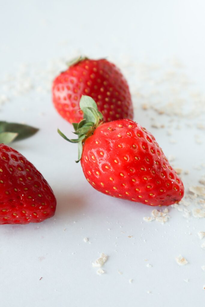 Fresh Strawberry Wallpaper: Vibrant Minimalist Background Design
