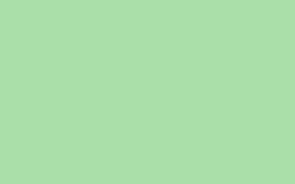 Serenity in Simplicity: A Solid Light Green Wallpaper with Pastel Accents