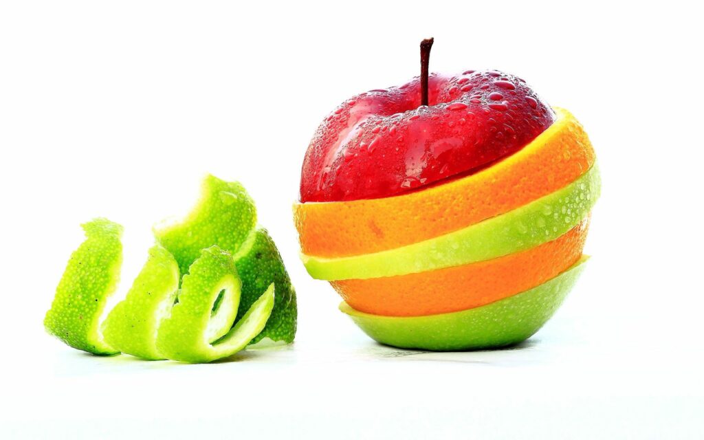 Vibrant Apple & Orange Fruit Wallpaper Background for Fresh Designs