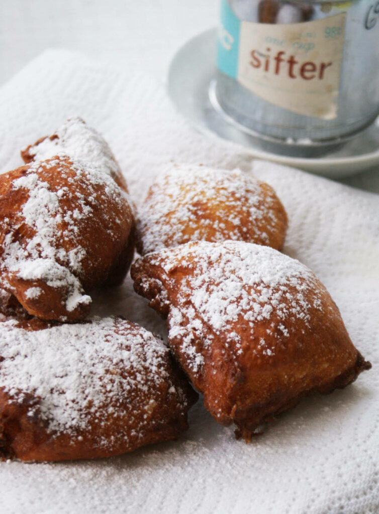 Close-Up of Buttermilk Biscuits with Powdered Sugar on Wallpaper