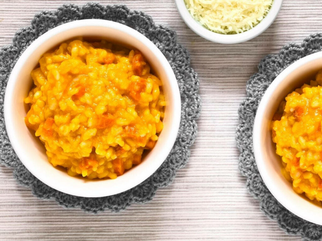 Fresh Carrot Cheese Risotto Wallpaper: Bowls & Grated Cheese Delight