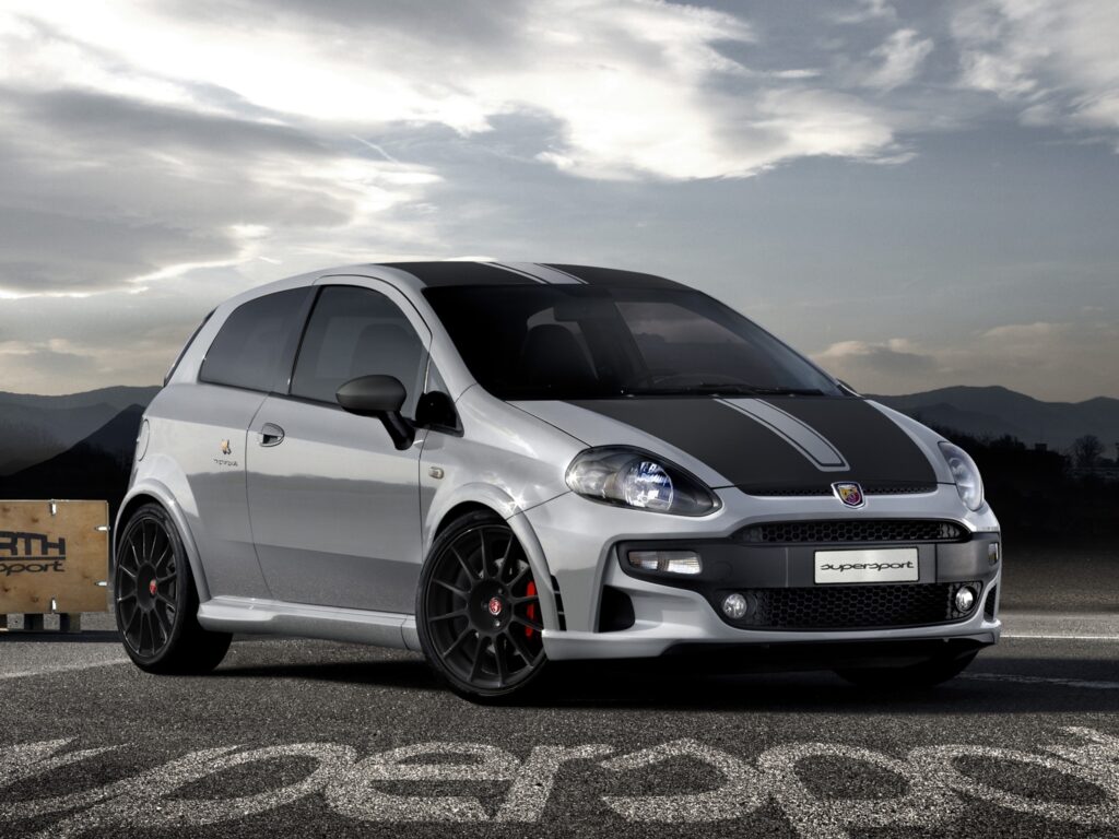 Stylish Gray Abarth Supersport Car with Mountain Background Wallpaper
