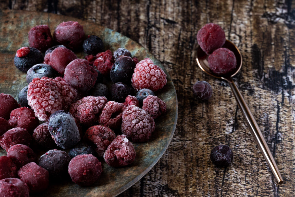Frosty Mixed Berries Close-Up: Rustic Wallpaper Background